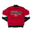 Red San Francisco 49ers satin jacket shown from the back, featuring a black collar, black and white sleeves, and a large 'SAN FRANCISCO 49ERS' logo with the 'SF' emblem on the back.